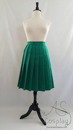 "This long pleated skirt, with straight knife pleats, is available in any size and any color. Please include your color choice and waist measurement, in inches or centimeters, in the 'notes to seller' section when ordering. This skirt is available from this listing in lengths from 23 inches to 28 inches. Pictures 1-5: Holly green in the 26\" length. This should be about mid-calf or midi length for someone 5'3\" - 5'4\" Picture 6: Teal in the 23\" length. The mannequin in this image has slimmer h Classic Cotton Pleated Lined Skirt, Classic Cotton Pleated Waist Skirt, Pleated Green Full Skirt, Solid Color Midi Skirt With Accordion Pleats, Classic Cotton Pleated Skirt With Accordion Pleats, Casual Green Pleated Full Skirt, Full Tennis Skirt, Classic Pleated Skirt With Pleated Waist, Cotton Pleated Skirt In Solid Color