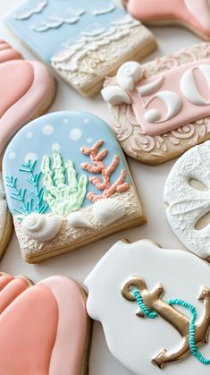 decorated cookies are displayed on a table