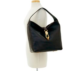 Soft and Chic     The Logo Lock Shoulder Bag owes its soft, slouchy shape and understated style to natural Florentine leather. A gold plated closure keeps contents secure, a wide shoulder strap guarantees comfort and a roomy interior provides great storage space. Both casual and chic, this bag will take you from workday lunches to Sunday brunches with ease. Elegant Smooth Grain Hobo Bag For Formal Occasions, Classic Hobo Bag With Magnetic Closure For Travel, Classic Hobo Bag With Metal Hardware For Everyday Use, Rectangular Hobo Bag With Brass Hardware For Travel, Elegant Hobo Bag With Metal Hardware For Travel, Timeless Hobo Bag For Daily Use With Gold-tone Hardware, Luxury Hobo Bag With Brass Hardware For Daily Use, Gold Hobo Bag For Formal Occasions, Elegant Gold Hobo Bag With Detachable Strap