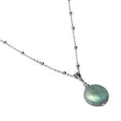 The gorgeous flashy, Labradorite stone gives off beautiful flashes of blues, golds and/or greens. These lovely stones are complemented with sparkling Sterling Silver components, including a gorgeous Sterling Silver Beaded Cable chain. You can purchase just the chain necklace, or the chain necklace with the pendant. According to an old Inuit story, a wandering Inuit warrior found the Northern Lights imprisoned in stones along the coast of Labrador. He was able to free most of the lights with a mighty blow of his spear, which are now seen at night in the Northern skies. Some of the lights were still trapped within the stone, and thus we have today the beautiful mineral known as Labradorite.  Labradorite has been called a Power stone, perhaps because it is thought to help relieve one's anxiet Elegant Iridescent Necklace With Round Beads, Elegant Iridescent Round Bead Necklaces, Elegant Iridescent Beaded Necklace, Iridescent Necklace With Faceted Beads For Gift, Iridescent Necklaces With Faceted Beads For Gifts, Beaded Chain Necklace, Power Stone, The Northern Lights, Labradorite Pendant