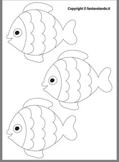 two fish that are cut out from the paper to make them look like they are swimming