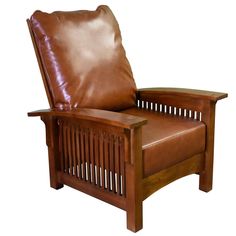 a brown leather reclining chair with wooden frame