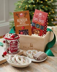 a wooden box filled with assorted holiday treats