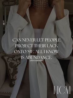 a woman wearing a white shirt and black choker with the quote can never let people project their lack onto me, all i know is abundance