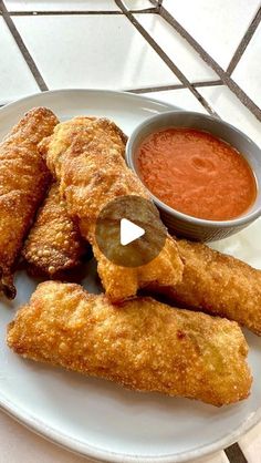 fried food on a plate with dipping sauce