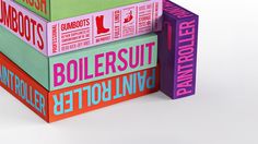 three colorful boxes stacked on top of each other with the words, bombsuit and bettoliving