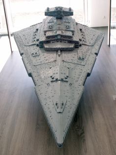 a model of a star destroyer on display in a museum