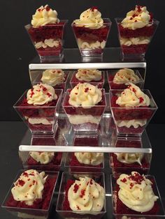 there are many red velvet cupcakes with white frosting on the top and bottom