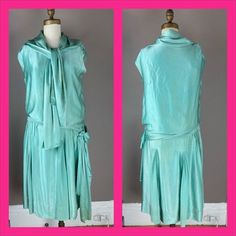 "Lustrous 1920s evening dress in a gorgeous minty green. Cut fairly straight, with a drop waist and box pleating in the skirt with more of a chiffon. I wasn't sure exactly how the drape on top was supposed to wrap but I think I got it right. Condition is very good structurally with the main body of the dress surprisingly sturdy.  I actually had the top of the lining professionally remade as the original china silk was shattered.  See the 9th photo for the restoration.  There is some yellow stain 1920s Evening Dress, Satin Party Dress, Minty Green, 1920s Fashion, I Got It, Box Pleats, Drop Waist, Dress Clothes For Women, Got It