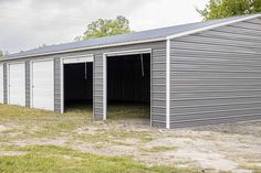 two garages side by side with one door open