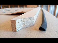 a piece of wood sitting on top of a counter