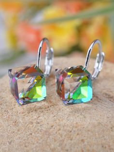 Brighten up your outfit with these Geometric Rhinestone Earrings! Made with silver and iridescent cubes, these earrings are a fun and stylish addition to any look. Shine on (literally) with these unique and modern earrings. Earrings Artificial, Cube Earrings, Magic Crystal, Cube Shape, Magic Cube, Vintage Boho Fashion, Crystal Fashion, Party Earrings, Watches Women Fashion