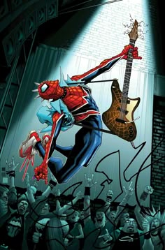 the amazing spider - man is playing guitar in front of an audience