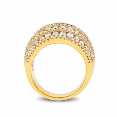 a yellow gold ring with white diamonds on the top and bottom, set in 18k gold