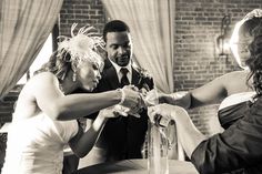 the bride and groom are getting ready to cut their wedding cake at the reception table