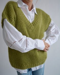 Hello, I'm the one, who won't let you down - green mohair vest. I will comfort you, keep you warm and will make you smile. I'm 100% hand made and proud of that. I consist of 70% knitt mohair and 30% of nylon, which makes me increadibly natural. I'm quite unique as could be worn all year long.I'm going well with dress, jeans, skirts ... or pretty much with everything you want. I'M AVAILABLE IN  DIFFERENT COLOURS!!!🌈I'm in one size and one size fits all because my measurements are :❤️   Width -54 Green Knit Sleeveless Vest, Green Sleeveless Knitted Sweater, Green Sleeveless Knit Vest, Sleeveless Green Sweater For Fall, Green V-neck Vest For Winter, Green Knitted Sleeveless Sweater Vest, Green Knit Vest For Fall, Green Winter Vest Top, Green Knitted Winter Vest