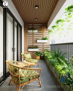 a balcony with chairs and plants on it