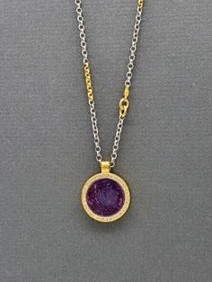 Gorgeous handmade fine necklace featuring a stunning trapiche ruby encircled by diamonds set in 14k gold, with 18k on the chain Luxury Gemstone Necklaces With Round Stone, Luxury Purple Diamond Necklace, Luxury Yellow Gold Ruby Necklace, Luxury Ruby Necklace In Yellow Gold, Diamond Fusion Necklace For Gift, Diamond Fusion Necklaces For Gifts, Fusion Style Diamond Necklace For Gift, Luxury Purple Pendant Necklace, Fine Jewelry Ruby Necklace With Single Cut Diamonds