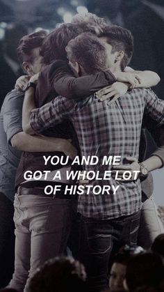 two people hugging each other with the words you and me got a whole lot of history