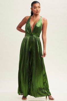 Be the day's style star in this eye-catching, moss green metallic jumpsuit. Featuring a pleated design and tie-back for a chic fit, you'll be sure to make a statement! Get ready to sparkle and shine! Glamorous Summer Gala Jumpsuits And Rompers, Green Backless Jumpsuits For Party, Green Backless Jumpsuits And Rompers For Party, Green Sleeveless Jumpsuits For Evening, Green Fitted Jumpsuit For Party, Green Sleeveless Party Jumpsuits And Rompers, Green Sleeveless Jumpsuits And Rompers For Evening, Green Fitted Jumpsuits And Rompers For Party, Fitted Green Jumpsuits And Rompers For Party