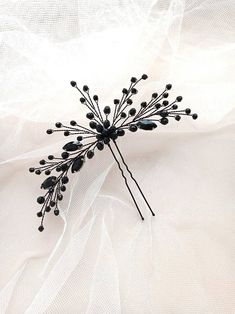 Introducing our exquisite crystal black hair pin, the perfect accessory to enhance your bridal or prom hairstyle. This stunning black hair clips for women is crafted with precision and attention to detail. It is made of black crystal beads, rhinestones, and jewelry wire, creating a captivating combination that exudes elegance and sophistication. With a length of approximately 5.5 inches, this hairpin provides a delicate yet impactful touch to your hair. Its size allows for versatility in styling, whether you choose to wear an updo, half-up hairstyle, or loose waves. Designed with special occasions in mind, this crystal hair pins adds a touch of glamour and sparkle to your look. The deep black color enhances your hairstyle, making it stand out and leaving a lasting impression. Whether you'r Black Hair Piece, Black Hair Pieces, Black Hair Comb, Crystal Headpiece Wedding, Black Hair Accessories, Homemade Bows, Black Hair Clips, Wedding Hair Head Piece, Crystal Hair Vine