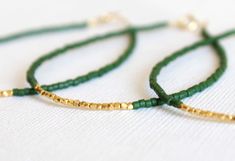 Gold vermeil bracelet - beaded bracelet - christmas bracelet - christmas gift - Friendship bracelet This Dainty Bracelet is very elegant and delicate perfect for a christmas gift or a special day or for an everyday look!!You can wear it alone or stack it with bracelets!!It can make a perfect gift for your bridesmaids!! It is made with: ✪ Tiny Seed Beads, you can choose your color!! ✪ Tiny gold vermeil faceted nugget beads ( Pure silver. ✪ Gold plated clasp. The measurement is aprrox 17cm but you Green Beaded Bracelet For Holiday, Green Beaded Bracelets For Festive Occasions, Festive Green Beaded Bracelets With Colorful Beads, Festive Green Beaded Bracelets, Handmade Green Bracelets For Holiday, Green Bracelet Jewelry For Holiday, Handmade Gold Beaded Bracelets For Christmas, Handmade Gold Beaded Bracelets For Holidays, Handmade Gold Bracelets For Holiday