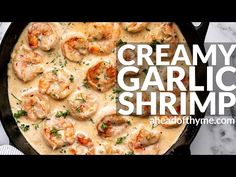 creamy garlic shrimp recipe in a cast iron skillet on a marble countertop with text overlay