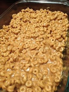 a large glass dish filled with cereal krispy kreme