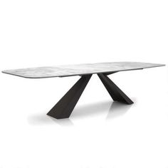 a white marble table with black metal legs and an x - shaped design on the top