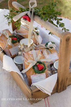 a wooden basket filled with food on top of a table