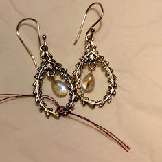 Beautiful Irredecent Moonstone Is Featured Here In This Wreath Design Sterling Silver Earrings.. The Moonstone Dangles Freely From The Top Of The Earring..