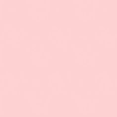 a pink background with an airplane flying in the sky