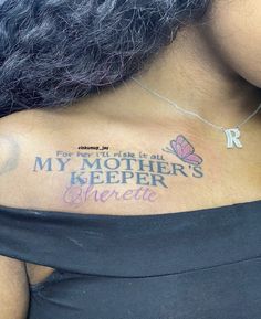 a woman with a butterfly tattoo on her chest and the words, my mother's keeper charlotte