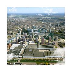 an aerial view of a city with tall buildings