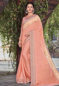 Peach satin silk embroidered saree with blouse 41120  Desc:  Color : Peach Saree Fabric : Satin Silk Work : Embroidery Wash Care : Dry clean Sleeve Style : Quarter Sleeve Long Sleeves : Done only in Custom Stitch Sleeves Lining : Done only in Custom Stitch Bust Size : 32 to 40 Inches Occasion : Wedding   Kitty Party   Sangeet   Party Wear   Reception   Gudi Padwa. With Express Free Shipping and Custom Stitching, Buy Indian Party wedding wear Bridal saris Peach satin silk embroidered saree with b Saree Black, Bridal Sari, Peach Saree, Chiffon Sarees, Paithani Saree, Traditional Silk Saree, Saree Designer, Wedding Green, Shilpa Shetty