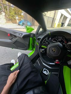 the interior of a car with green trim