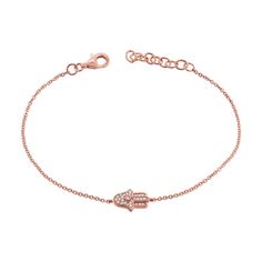 Embrace protection and elegance with this stunning 14K Gold Hamsa Chain Bracelet. The delicate chain showcases a beautifully crafted Hamsa charm, a symbol of good fortune and protection, adorned with shimmering diamonds totaling 0.12 carats. The brilliant diamonds enhance the charm's intricate design, adding a touch of sparkle and sophistication. Perfect for daily wear or special occasions, this bracelet features a secure clasp for a comfortable and worry-free fit. Whether as a meaningful gift o Elegant Diamond Bracelets With Charms, Elegant Diamond Charm Bracelets, Tennis Jewelry, Bracelet With Diamonds, Engagement Rings Couple, Hamsa Bracelet, Hamsa Charm, Gold Hamsa, Custom Ring Designs