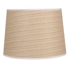 a beige lamp shade on a white background