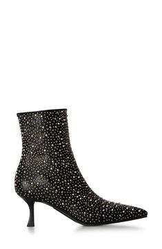 Polished studs create an edgy aesthetic on a bold bootie balanced by a pointy toe and tapered flare heel. Side zip closure Synthetic upper, lining and sole Imported Asian & Pacific Islander Owned/Founded Chic Embellished Heeled Boots For Night Out, Spiked Heeled Boots For Winter Party, Spiked Heeled Boots For Fall Party, Edgy Studded Party Boots, Spiked Heeled Boots For Party And Fall, Studded Heeled Boots For Night Out In Winter, Fall Boots With Spikes And Pointed Toe, Fitted Embellished Boots With Pointed Toe, Winter Boots With Spikes And Pointed Toe