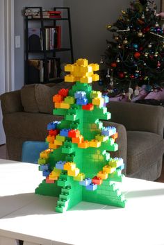 a lego christmas tree sitting on top of a table