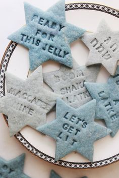 star shaped cookies with words written on them