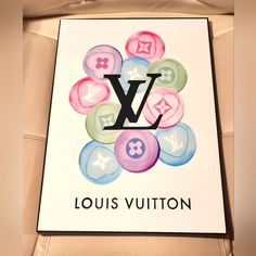 the louis vuitton logo is displayed on a card