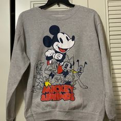 This Classic Mickey And Friends Sweatshirt Pit Is 22 And Length Is 29 B0020 Casual Mickey Mouse Crew Neck Sweatshirt, Casual Crew Neck Mickey Mouse Sweatshirt, Casual Mickey Mouse Tops For Winter, Casual Gray Sweatshirt With Cartoon Print, Mickey Mouse Crew Neck Top For Winter, Casual Mickey Mouse T-shirt For Fall, Friends Sweatshirt, Disney Shirts, Mickey And Friends