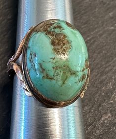 14k custom artist hand wrought wonderful big cabochon bezel set Turquoise with natural matrix has a modernist timeless feel to it.  Condition is very good for its age, stone in good condition, pictures show the details.  Size 5, approx 3/4" north to south on finger, wt.- 3.9 grams.  Lovers of Turquoise-this is  a soulful gold Turquoise ring that is unique and timeless.  Looks like a Robin's egg, nice big cab, just the right amount of hand created design to the setting(interesting) that balances with the Turquoise Cabochon-. A jewelers work of art. Big Turquoise Ring, Turquoise Gold Ring, Cabochon Ring, Natural Turquoise, Matrix, Rings Statement, Turquoise Ring, Statement Rings, Jewelry Rings