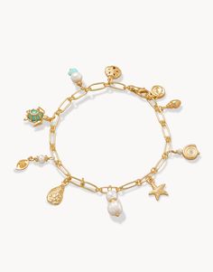 Ashore Bracelet Pearl/Sea Foam from Spartina 449 Ocean Charm Bracelet, Beach Charms Bracelet Jewelry, Gold Charm Bracelet With Lobster Clasp For Beach, Gold Bohemian Jewelry With Starfish Charm, Bohemian Gold Jewelry With Starfish Charm, Bohemian Gold Starfish Charm Jewelry, Ocean-inspired Bracelet With Starfish Charm, Ocean-inspired Starfish Charm Bracelet, Gold Pearl Charm Bracelet For Beach