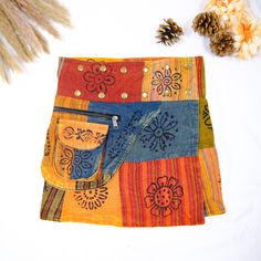 Hippie Skirt, Short Patch Mini Skirt, Vintage Wrap Cotton Skirt with Side Pockets, Plus Size , Boho Handmade Summer Skirt, Popper Button Add a touch of vintage charm to your wardrobe with our Hippie Skirt. This handmade cotton skirt features a patchwork design and adjustable waist with popper buttons, making it both stylish and comfortable to wear. Short Patch Mini Skirt Side Pockets for convenience Boho, Retro Style for festival fashion or everyday wear Suitable for All Seasons with Mid Waist Height and Button Closure Type. The wrap style of this skirt adds a chic element that's perfect for casual occasions. Its mini length is versatile and can be paired with flats or heels depending on the occasion. Plus size options are available to ensure that every woman can rock this look. Elevate yo Cotton Mini Skirt For Festivals, Hippie Cotton Mini Skirt For Festivals, Casual Cotton Mini Skirt For Festival, Bohemian Cotton Mini Skirt, Bohemian Mini Cotton Skirt, Bohemian Mini Skirt In Cotton, Cotton Hippie Mini Skirt, Hippie Cotton Mini Skirt, Hippie Style Cotton Mini Skirt