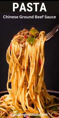 the pasta is being served in a pan with noodles and vegetables on it, as well as