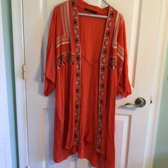 Orange Embroidered Kimono, Great Condition, Size L Hits Around Knees Never Worn Ties At Chest See Photos For Content And Care Long Fall Vacation Tops, Orange Embroidered V-neck Top, Embroidered Orange V-neck Tops, Bohemian Orange Outerwear For Summer, Summer Bohemian Orange Outerwear, Embroidered Casual Spring Kimono, Casual Embroidered Spring Kimono, Casual Fall Kimono With Floral Embroidery, Casual Long Embroidered Outerwear