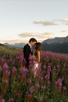 Bride and groom smile and hug each other close in the purple wildflowers in Aspen, Colorado. Photography by Aspen wedding photographer, Linden Wilson Engagement Photos In Wildflowers, Meadow Proposal, Engagement Photos Wildflowers, Wild Flower Engagement Photos, Wildflower Proposal, Colorado Elopement Photography, Eloping Photos, Engagement Photos Flowers, Wildflower Engagement Photos