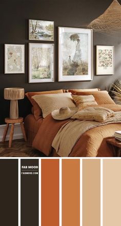 a bedroom with brown walls and pictures on the wall, including an orange bed spread